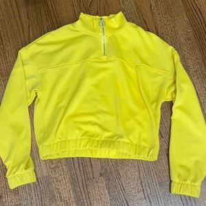 Cropped yellow garage quarter zip.